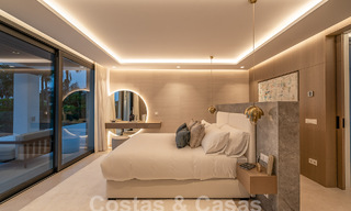 Nueva villa de diseño modernista en venta con vistas al campo de golf en un resort de golf, Marbella - Benahavis 55519 