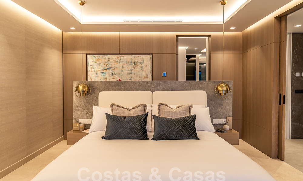Nueva villa de diseño modernista en venta con vistas al campo de golf en un resort de golf, Marbella - Benahavis 55521