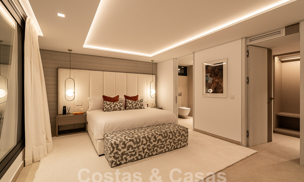 Nueva villa de diseño modernista en venta con vistas al campo de golf en un resort de golf, Marbella - Benahavis 55529