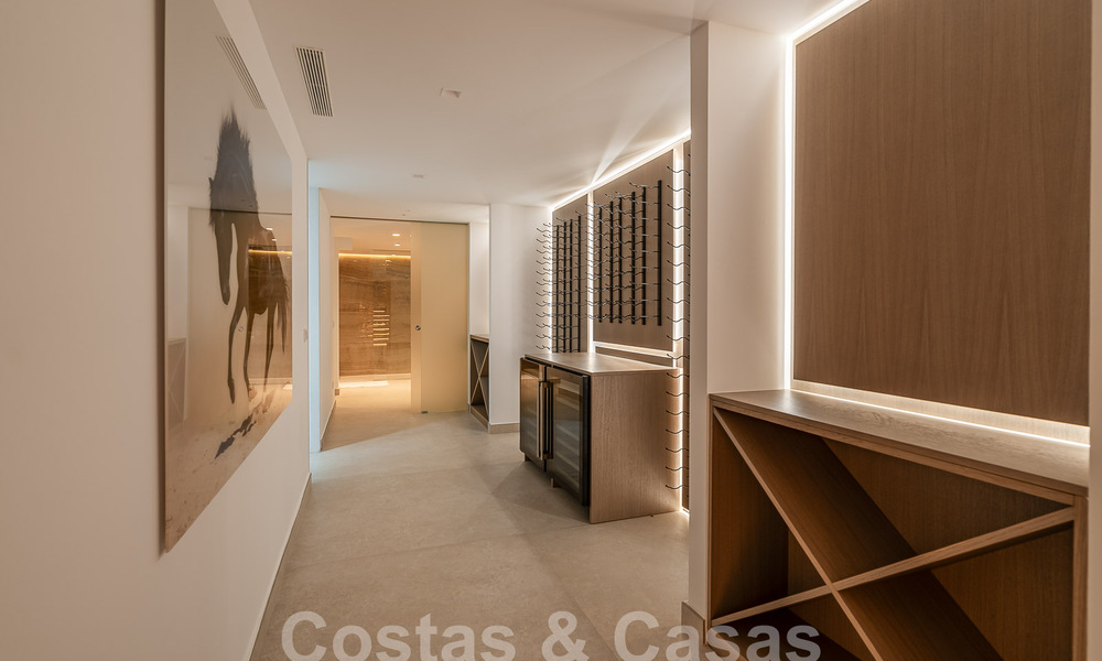 Nueva villa de diseño modernista en venta con vistas al campo de golf en un resort de golf, Marbella - Benahavis 55531