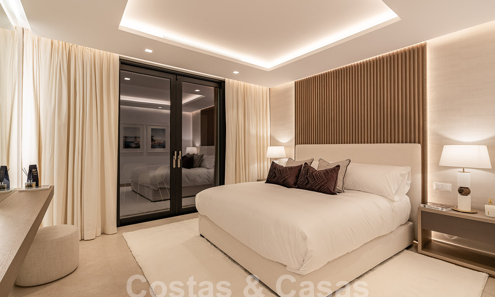 Nueva villa de diseño modernista en venta con vistas al campo de golf en un resort de golf, Marbella - Benahavis 55536