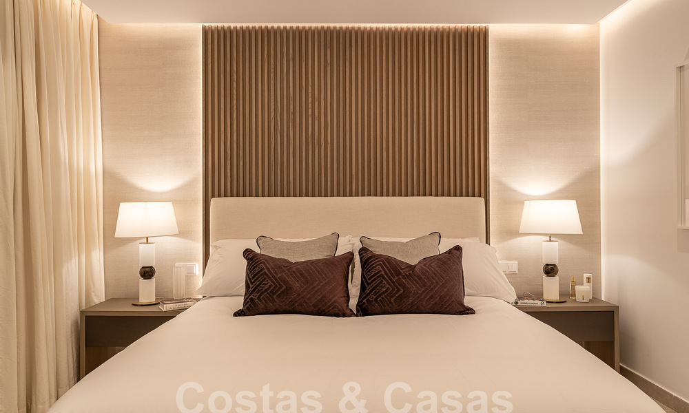 Nueva villa de diseño modernista en venta con vistas al campo de golf en un resort de golf, Marbella - Benahavis 55537