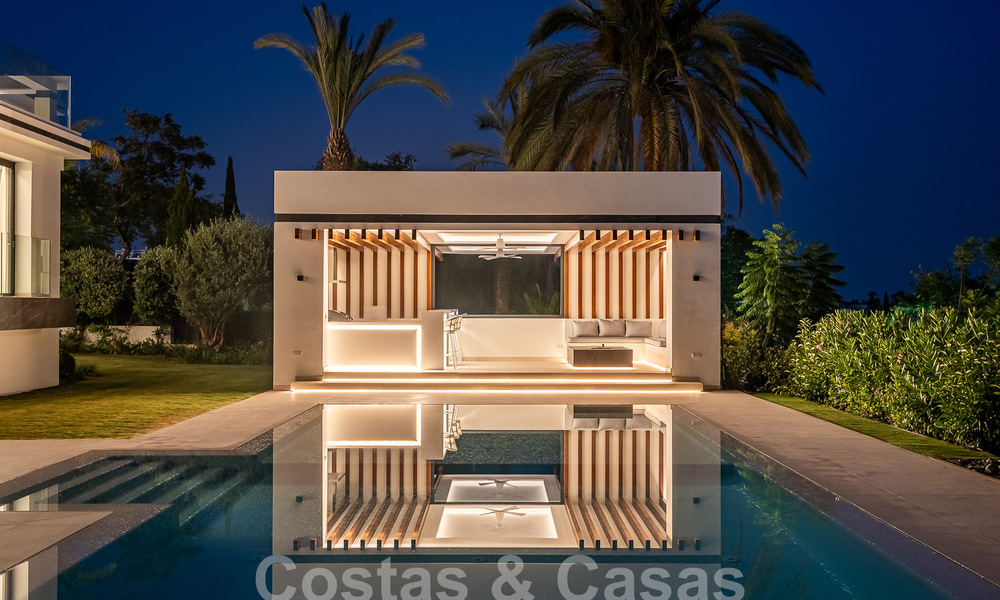 Nueva villa de diseño modernista en venta con vistas al campo de golf en un resort de golf, Marbella - Benahavis 55546