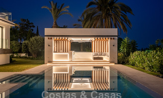 Nueva villa de diseño modernista en venta con vistas al campo de golf en un resort de golf, Marbella - Benahavis 55546 