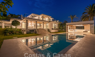 Nueva villa de diseño modernista en venta con vistas al campo de golf en un resort de golf, Marbella - Benahavis 55547 