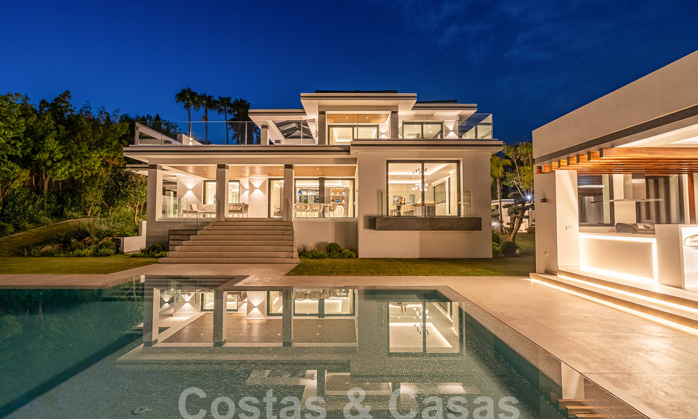 Nueva villa de diseño modernista en venta con vistas al campo de golf en un resort de golf, Marbella - Benahavis 55548