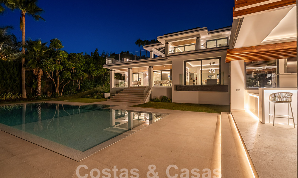 Nueva villa de diseño modernista en venta con vistas al campo de golf en un resort de golf, Marbella - Benahavis 55549