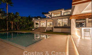 Nueva villa de diseño modernista en venta con vistas al campo de golf en un resort de golf, Marbella - Benahavis 55549 