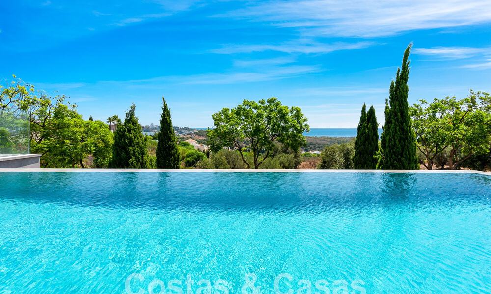 Nueva villa de diseño modernista en venta con impresionantes vistas al mar en prestigioso resort de golf en Marbella - Benahavis 55823