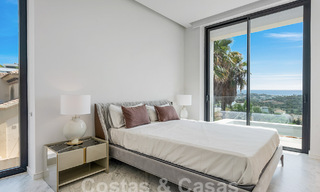 Nueva villa de diseño modernista en venta con impresionantes vistas al mar en prestigioso resort de golf en Marbella - Benahavis 55844 