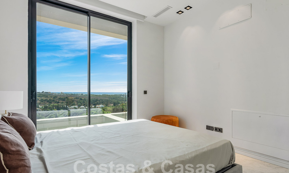 Nueva villa de diseño modernista en venta con impresionantes vistas al mar en prestigioso resort de golf en Marbella - Benahavis 55845