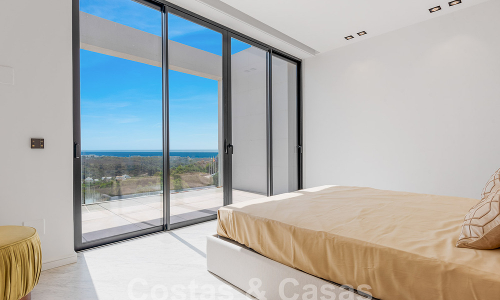 Nueva villa de diseño modernista en venta con impresionantes vistas al mar en prestigioso resort de golf en Marbella - Benahavis 55850