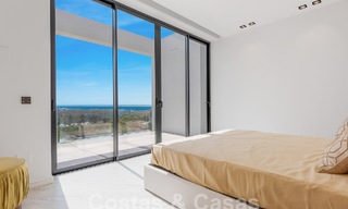 Nueva villa de diseño modernista en venta con impresionantes vistas al mar en prestigioso resort de golf en Marbella - Benahavis 55850 