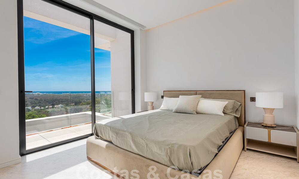 Nueva villa de diseño modernista en venta con impresionantes vistas al mar en prestigioso resort de golf en Marbella - Benahavis 55858