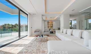 Nueva villa de diseño modernista en venta con impresionantes vistas al mar en prestigioso resort de golf en Marbella - Benahavis 55873 