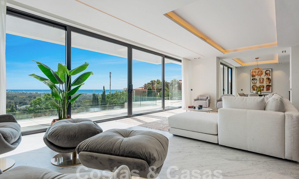 Nueva villa de diseño modernista en venta con impresionantes vistas al mar en prestigioso resort de golf en Marbella - Benahavis 55874