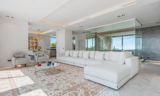 Nueva villa de diseño modernista en venta con impresionantes vistas al mar en prestigioso resort de golf en Marbella - Benahavis 55875 