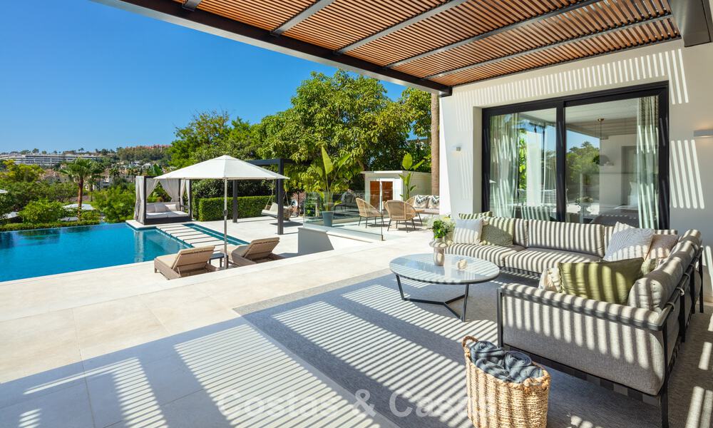 Villa de lujo, moderna y simétrica en venta a un paso de los campos de golf del valle de Nueva Andalucia, Marbella 56176