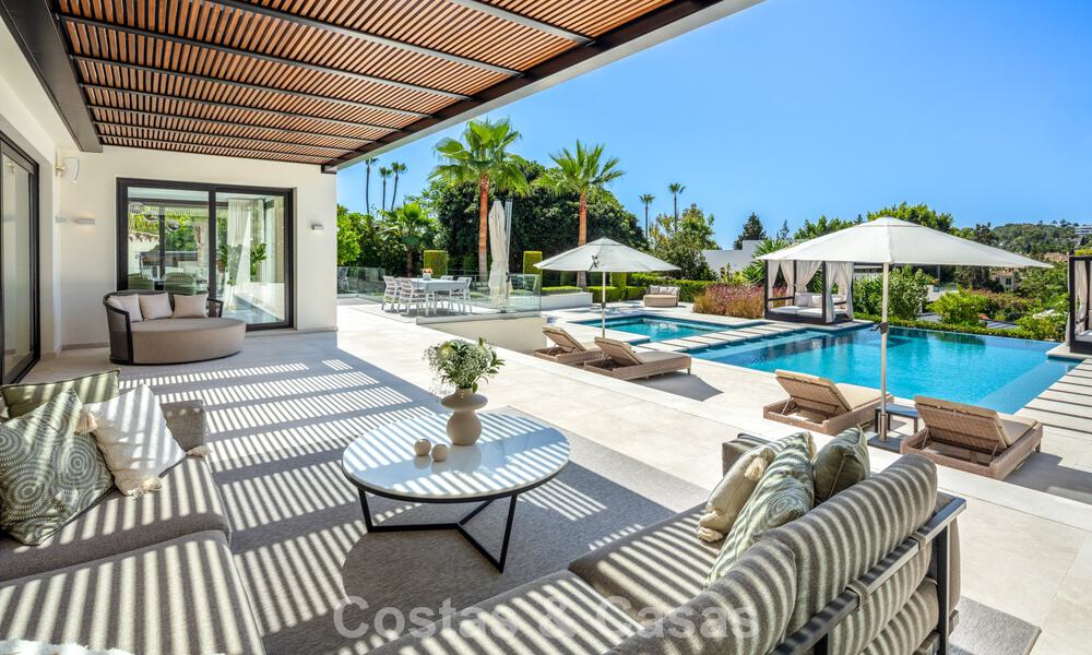 Villa de lujo, moderna y simétrica en venta a un paso de los campos de golf del valle de Nueva Andalucia, Marbella 56183