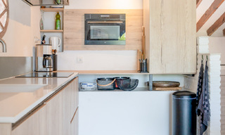 Encantadora casa adosada reformada en venta en complejo cerrado en primera línea de playa en la Nueva Milla de Oro entre Marbella y Estepona 58166 