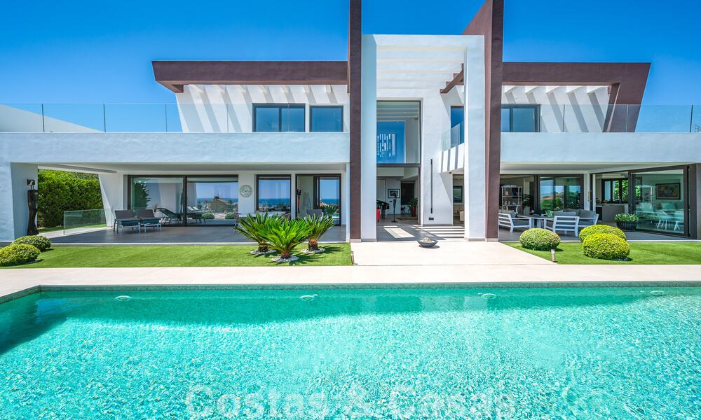 Villa de lujo ultramoderna en venta con vistas al mar en un resort de golf de cinco estrellas en Marbella - Benahavis 57615