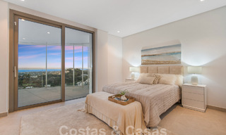 Prestigioso apartamento de lujo en venta con vistas panorámicas al mar, golf y montaña en Marbella - Benahavis 58432 