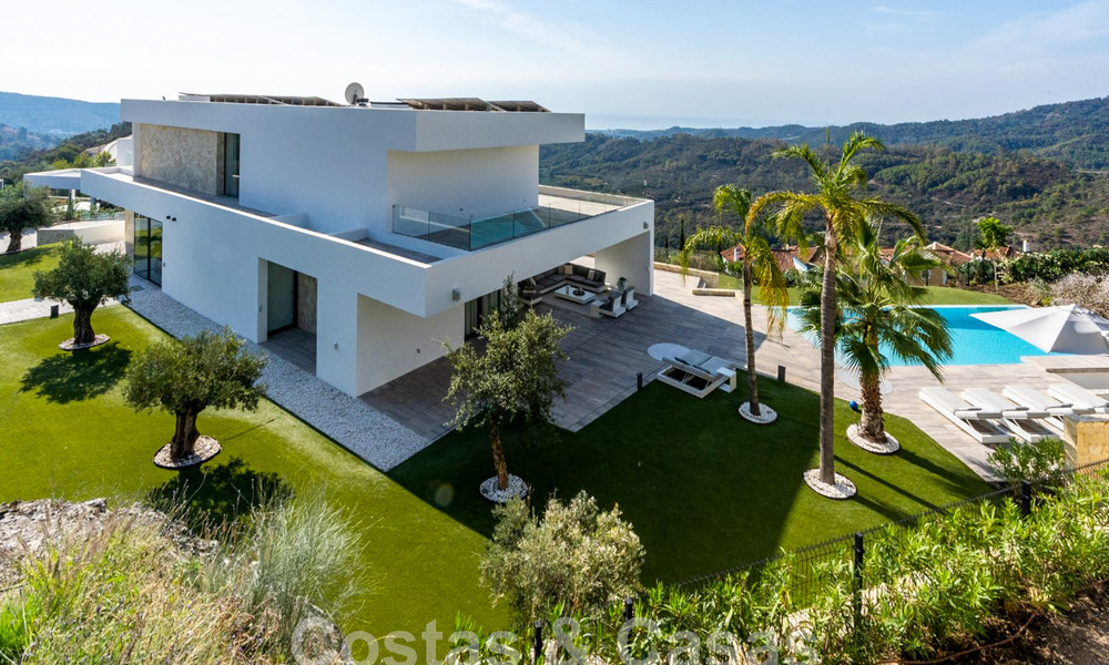 Moderna villa de lujo en venta con vistas al mar en urbanización cerrada rodeada de naturaleza en Marbella - Benahavis 59238