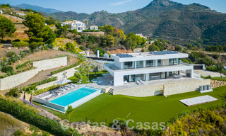 Moderna villa de lujo en venta con vistas al mar en urbanización cerrada rodeada de naturaleza en Marbella - Benahavis 59240 