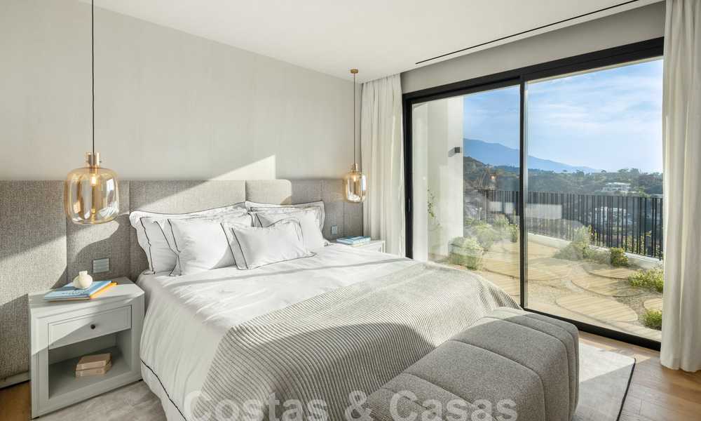 Moderna villa andaluza de lujo con vistas despejadas al mar en venta en urbanización cerrada de La Quinta, Marbella - Benahavis 59541