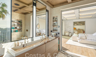 Moderna villa andaluza de lujo con vistas despejadas al mar en venta en urbanización cerrada de La Quinta, Marbella - Benahavis 59545 
