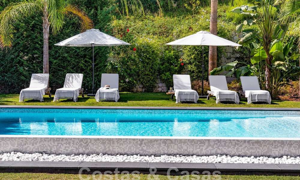 Moderna villa de lujo en venta en un estilo arquitectónico contemporáneo, a poca distancia de Puerto Banús, Marbella 59649