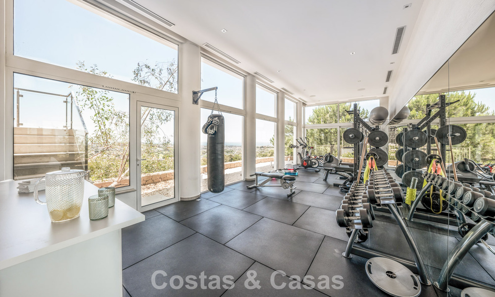 Sofisticada villa de lujo en venta en exclusivo resort de golf con vistas panorámicas en La Quinta, Marbella - Benahavis 60415