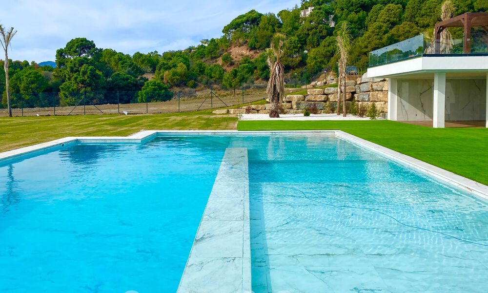 Nueva villa moderna de lujo en venta con vistas panorámicas al mar en el exclusivo Marbella Club Golf Resort en Benahavis - Marbella 61967