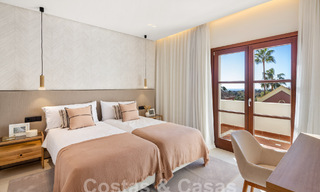 Lujosa adosada mediterránea reformada en venta en una exclusiva zona residencial cerrada en la Milla de Oro de Marbella 62737 