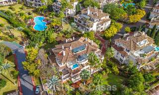 Amplio y lujoso ático de 4 dormitorios en venta en complejo en primera línea de golf en Nueva Andalucía, Marbella 63054 