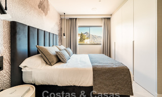 Apartamento de lujo en venta con un interior moderno en una ubanización de lujo en el valle del golf de Nueva Andalucia, Marbella 63260 