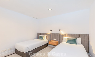 Villa modernista con diseño elegante e impresionantes vistas al mar en venta en urbanización cerrada de golf en Marbella Este 63580 