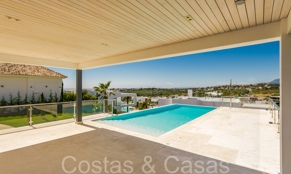 Nueva villa con estilo arquitectónico moderno en venta en el valle del golf de Nueva Andalucía, Marbella 65912