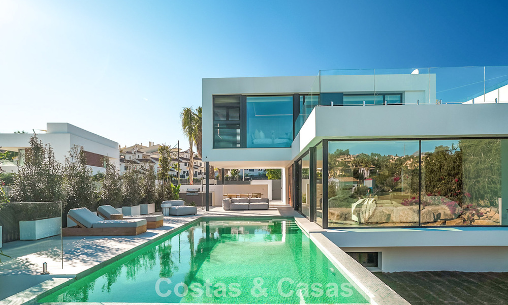 Villa de lujo moderna lista para entrar a vivir en venta junto al campo de golf en la Nueva Milla de Oro, Marbella - Estepona 66408
