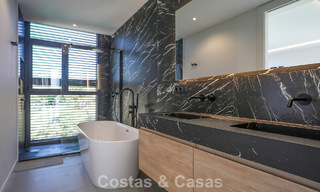 Villa de lujo moderna lista para entrar a vivir en venta junto al campo de golf en la Nueva Milla de Oro, Marbella - Estepona 66416 