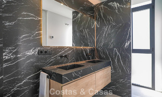 Villa de lujo moderna lista para entrar a vivir en venta junto al campo de golf en la Nueva Milla de Oro, Marbella - Estepona 66417 