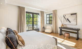 Villa magistral con estilo arquitectónico morisco-andaluz en venta, rodeada de campos de golf en el valle del golf de Nueva Andalucía, Marbella 67095 