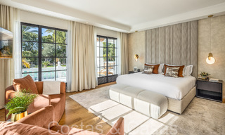 Villa magistral con estilo arquitectónico morisco-andaluz en venta, rodeada de campos de golf en el valle del golf de Nueva Andalucía, Marbella 67097 