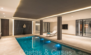 Amplia villa de lujo modernista en venta con vistas al campo de golf en Benahavis - Marbella 68127 