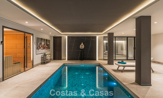 Amplia villa de lujo modernista en venta con vistas al campo de golf en Benahavis - Marbella 792538 