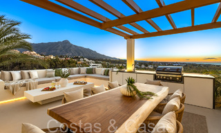 Ático dúplex de primera calidad con vistas panorámicas al mar y piscina privada en venta en Nueva Andalucía, Marbella 69457 