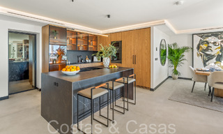 Ático dúplex de primera calidad con vistas panorámicas al mar y piscina privada en venta en Nueva Andalucía, Marbella 69466 