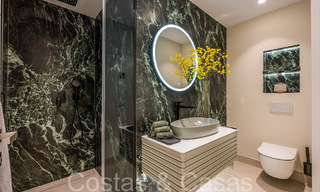 Lujoso apartamento en planta baja en venta en un complejo de playa de 5 estrellas en la Nueva Milla de Oro entre Marbella y Estepona 71385 
