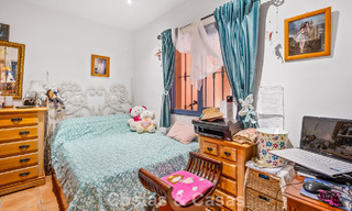 Amplia casa adosada con jardín privado en venta, rodeada de campos de golf en Nueva Andalucía, Marbella 775068 