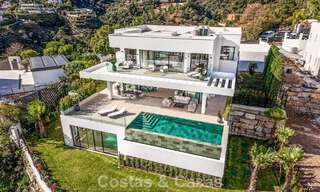 Sofisticada villa de diseño con magníficas vistas al mar en venta en El Madroñal, Benahavis - Marbella 795656 